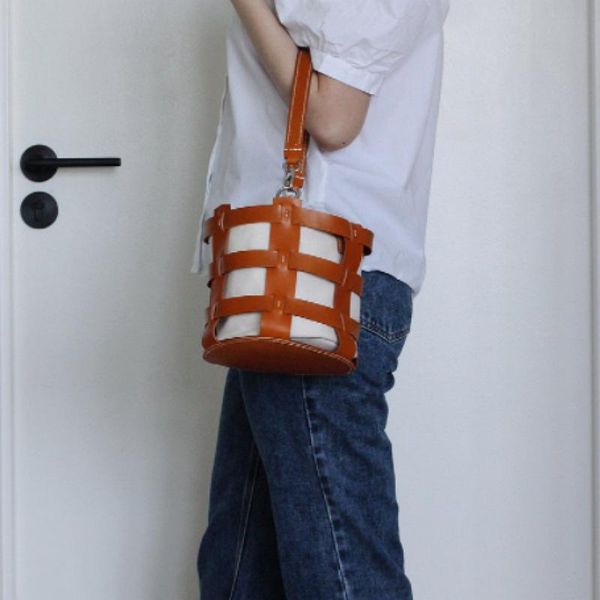 evening bags minority retro women's woven bucket bag pu leather ins wind messenger small round simple literary single shoulder
evening bags minority retro women's woven bucket bag pu leather ins wind messenger small round simple literary single shoulder