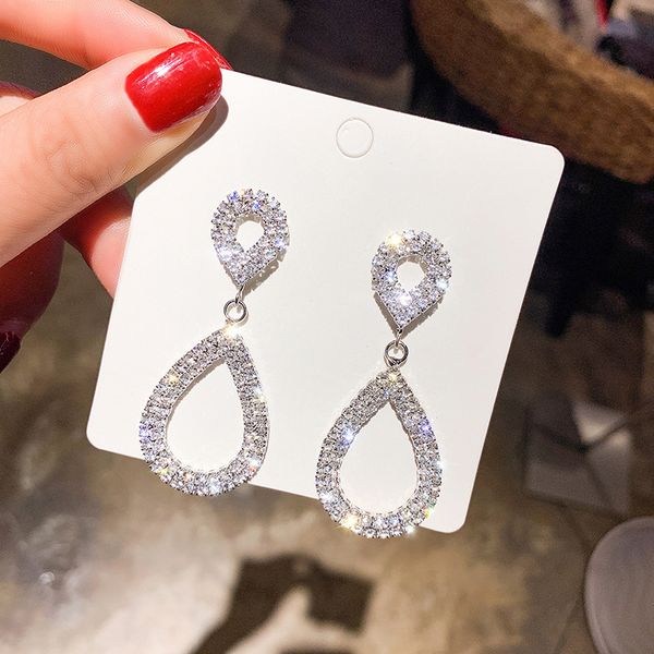 925 silver needle micro inlaid zircon water drop earrings women's trend personality versatile exaggerated net red earrings
925 silver needle micro inlaid zircon water drop earrings women's trend personality versatile exaggerated net red earrings