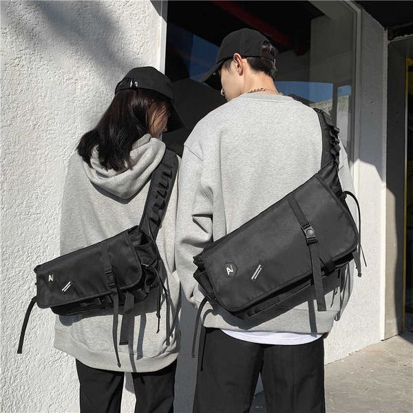 2021 street fashion msenger men's and women's large capacity student one shoulder backpack tooling postman bag, Blue;pink
2021 street fashion msenger men's and women's large capacity student one shoulder backpack tooling postman bag, Blue;pink