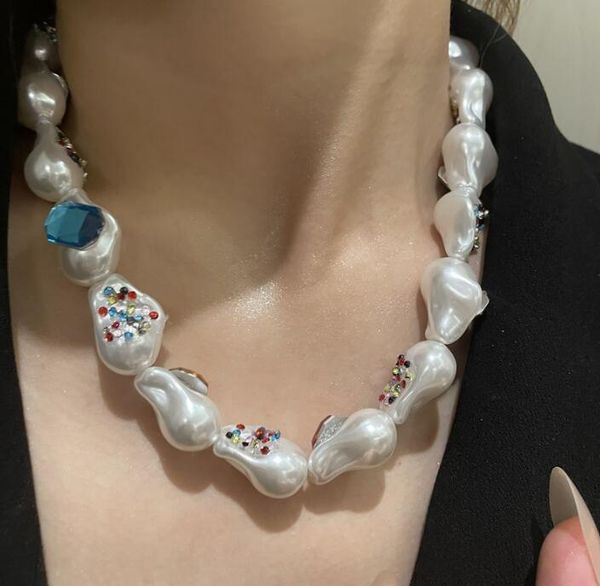 chokers french retro special-shaped large pearl short clavicle chain boho style handmade color rhinestone women necklace, Golden;silver
chokers french retro special-shaped large pearl short clavicle chain boho style handmade color rhinestone women necklace, Golden;silver