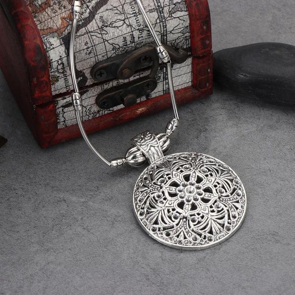 pendant necklaces tibetan jewelry vintage silver plated bohemian hollow carved round pendants chain for women female 
pendant necklaces tibetan jewelry vintage silver plated bohemian hollow carved round pendants chain for women female