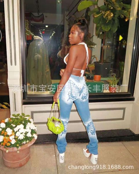 women's jeans large size butterfly print denim trousers with white feet, Blue
women's jeans large size butterfly print denim trousers with white feet, Blue