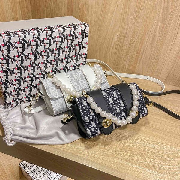 texture bag women's fashion letter canvas hand messenger summer pearl handle shoulder bag outlet purse
texture bag women's fashion letter canvas hand messenger summer pearl handle shoulder bag outlet purse