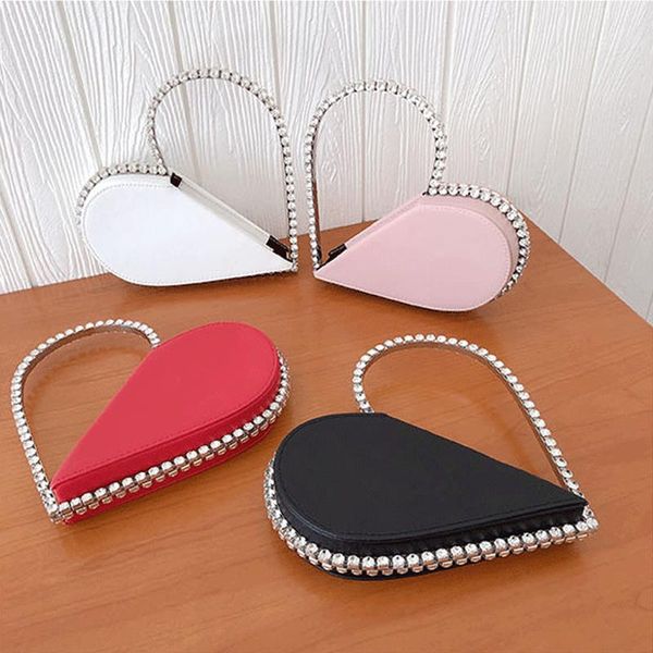 evening bags heart shape rhinestone metal frame bag women wedding party clutch
evening bags heart shape rhinestone metal frame bag women wedding party clutch