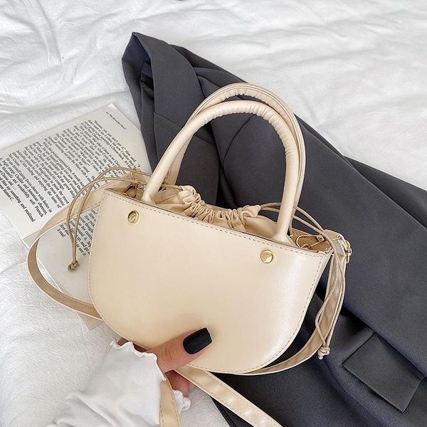 duffel bags trend, summer fashion, simple, western style, 2021 cross-body portable drawstring semicircle solid color female bag
duffel bags trend, summer fashion, simple, western style, 2021 cross-body portable drawstring semicircle solid color female bag