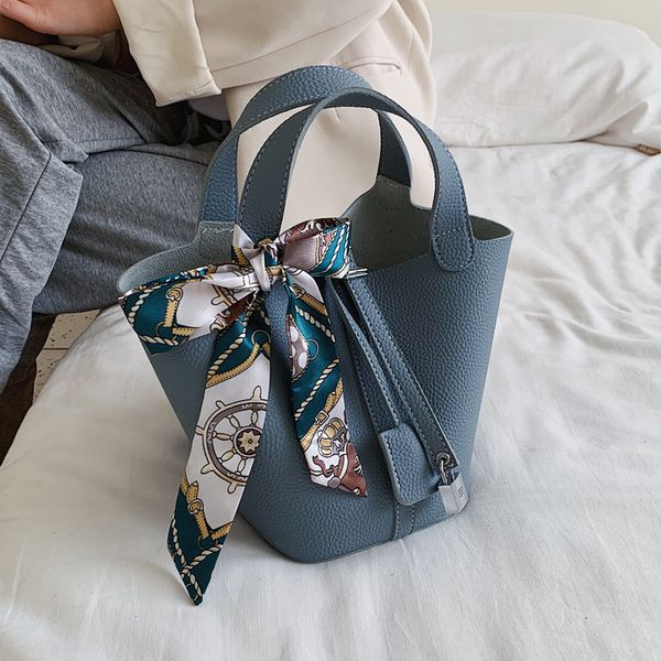 high-quality s 2021 new litchi pattern vegetable basket women's fashion light luxury bucket large capacity hand carrying mother handbag
high-quality s 2021 new litchi pattern vegetable basket women's fashion light luxury bucket large capacity hand carrying mother handbag