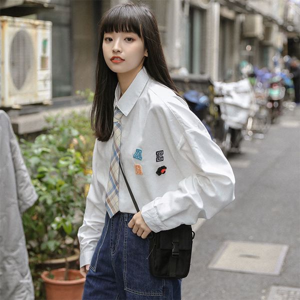 women's blouses & shirts 2021 spring preppy style women long sleeve loose white girl student turn-down collar casual blouse femme
women's blouses & shirts 2021 spring preppy style women long sleeve loose white girl student turn-down collar casual blouse femme