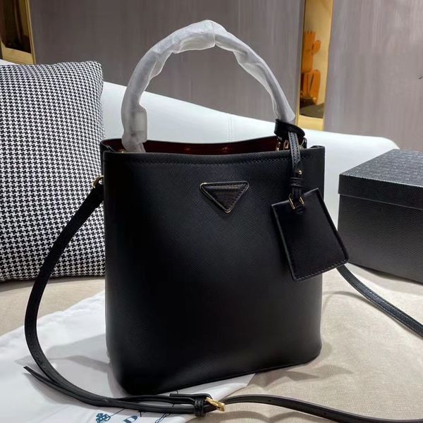 saffiano bucket bag cowhide cross shoulder bags versatile handbag plain open hard nylon single casual interior compartment imitation designe
saffiano bucket bag cowhide cross shoulder bags versatile handbag plain open hard nylon single casual interior compartment imitation designe