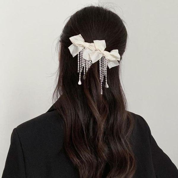 korean hair accessories rhinestone tassel bow simple hairpin horizontal clip horsetail spring worker, Golden;silver
korean hair accessories rhinestone tassel bow simple hairpin horizontal clip horsetail spring worker, Golden;silver