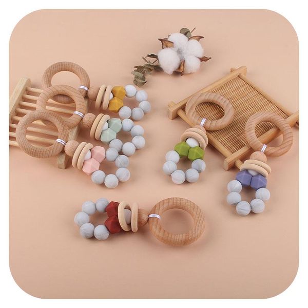 beech wood baby teethers toys rattle silicone beads infant soothers feeding accessories newborn nursing teether toy
beech wood baby teethers toys rattle silicone beads infant soothers feeding accessories newborn nursing teether toy