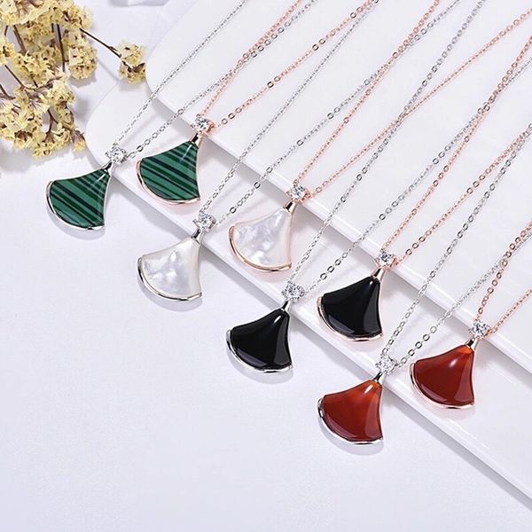 design jewelry baojia s925 sterling silver pendant fan-shaped pendulum necklace white fritillaria red chalcedony small skirt collarbone chai
design jewelry baojia s925 sterling silver pendant fan-shaped pendulum necklace white fritillaria red chalcedony small skirt collarbone chai
