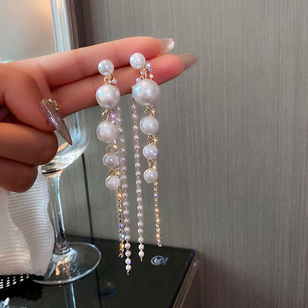 925 silver needle long tassel pearl earrings with exaggerated design and diamond earrings, Golden;silver
925 silver needle long tassel pearl earrings with exaggerated design and diamond earrings, Golden;silver