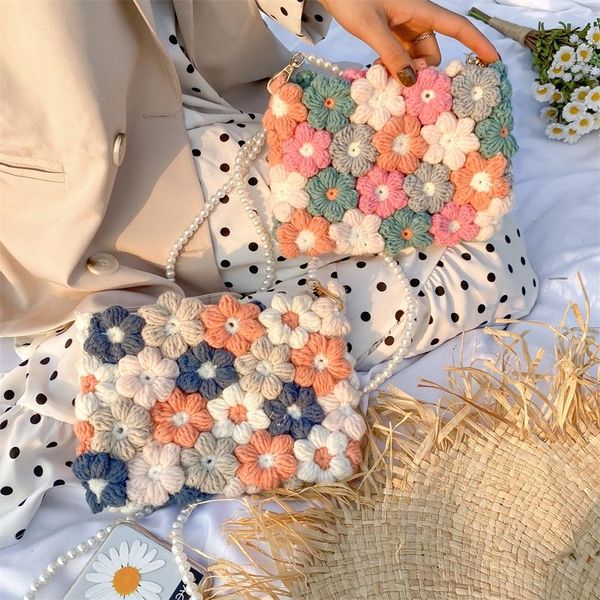 storage bags hand geweven wollen gehaakte tas met bladerdeeg bloemen vrouwen 2021 nieuwe creatieve chrysant messenger bag
storage bags hand geweven wollen gehaakte tas met bladerdeeg bloemen vrouwen 2021 nieuwe creatieve chrysant messenger bag