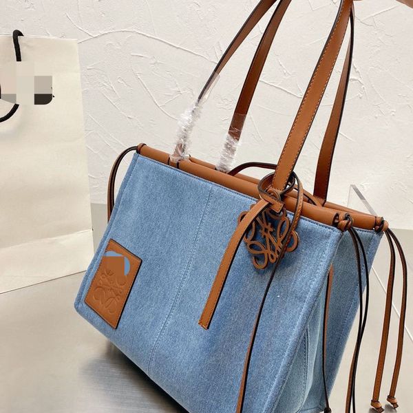 2021 handbag lo new yi denim tote canvas one shoulder shopping bag large capacity mommy beach bagaigq
2021 handbag lo new yi denim tote canvas one shoulder shopping bag large capacity mommy beach bagaigq