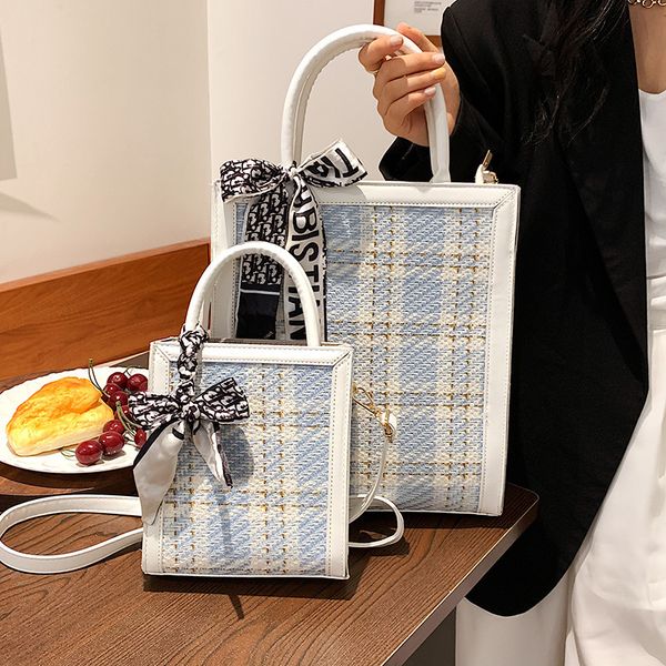 factory direct sale 75% off large capacity 2021 new woven plaid ribbon portable bucket small fresh single shoulder messenger bags
factory direct sale 75% off large capacity 2021 new woven plaid ribbon portable bucket small fresh single shoulder messenger bags