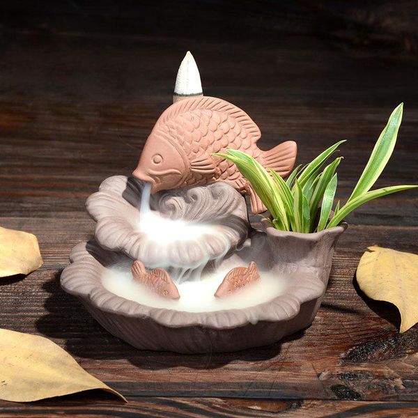 fragrance lamps chinese ceramic purple sand incense burner backflow lotus fish fengshui cones holder home living room bouddha decoration
fragrance lamps chinese ceramic purple sand incense burner backflow lotus fish fengshui cones holder home living room bouddha decoration