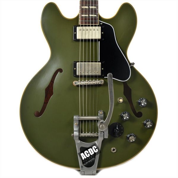 es 345 reissue olive drab matte green semi hollow electric guitar bigs tremolo bridge, varitone knob, cream bindings, nickel hardware
es 345 reissue olive drab matte green semi hollow electric guitar bigs tremolo bridge, varitone knob, cream bindings, nickel hardware