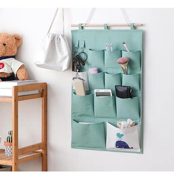 storage bags cotton linen hanging bag 3/7 pockets wall mounted wardrobe hang bedroom bedside cosmetic clothes organizer
storage bags cotton linen hanging bag 3/7 pockets wall mounted wardrobe hang bedroom bedside cosmetic clothes organizer