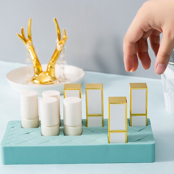 24 grids silicone lipstick storage rack organizer embedded non-slip makeup organizer portable lipsticks holder easy for travel
24 grids silicone lipstick storage rack organizer embedded non-slip makeup organizer portable lipsticks holder easy for travel