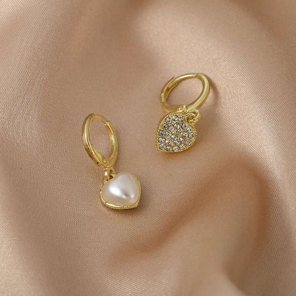 korean pearl gold peach heart two sides wear design feeling net red temperament new stud ear button female, Black
korean pearl gold peach heart two sides wear design feeling net red temperament new stud ear button female, Black