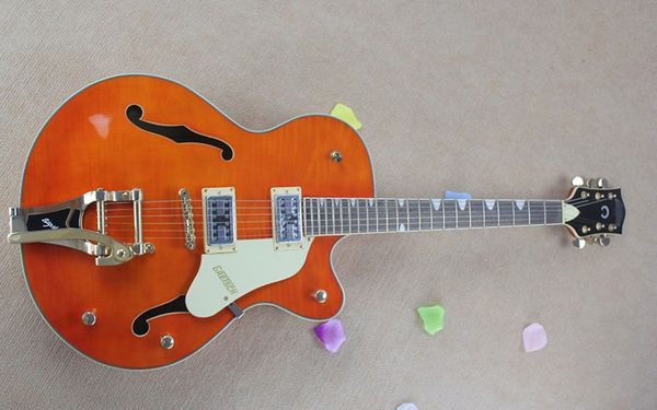 g6120s thick body jazz g6120s semi hollow double f hole rocker electric guitar orange yellow guard plate
g6120s thick body jazz g6120s semi hollow double f hole rocker electric guitar orange yellow guard plate