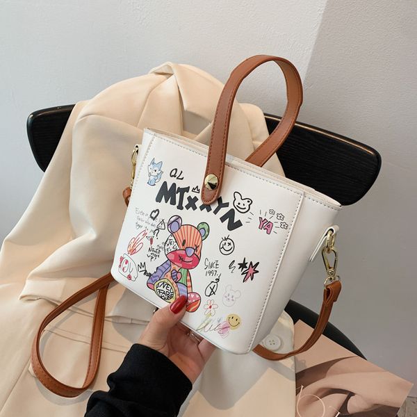 2021 summer fashion cartoon printed women's bag animation graffiti bucket style messenger handbag
2021 summer fashion cartoon printed women's bag animation graffiti bucket style messenger handbag
