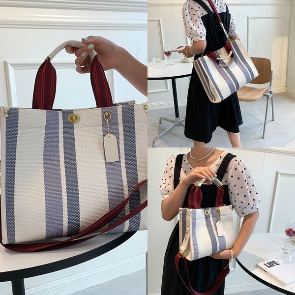 july canvas striped women's bag new portable tote bag sling shoulder diagonal cross handbags
july canvas striped women's bag new portable tote bag sling shoulder diagonal cross handbags