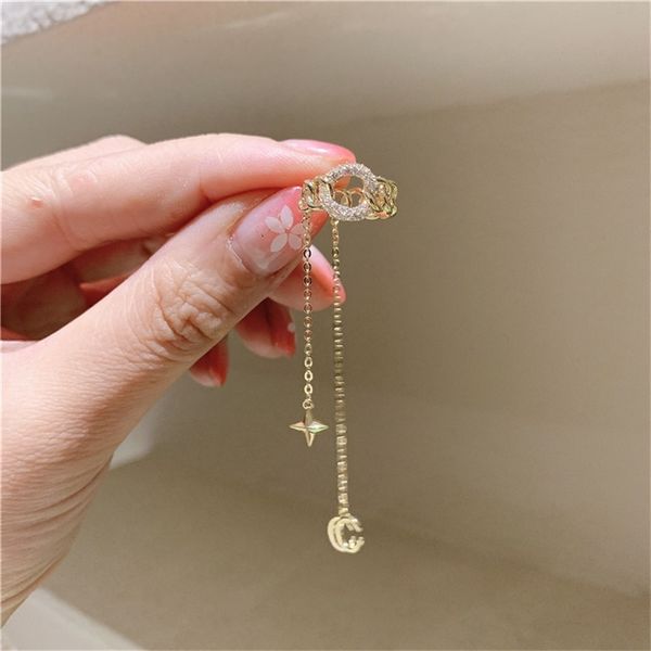 niche design personality micro inlaid zircon circle female star moon tassel clip bone no ear hole cold wind earrings, Black
niche design personality micro inlaid zircon circle female star moon tassel clip bone no ear hole cold wind earrings, Black