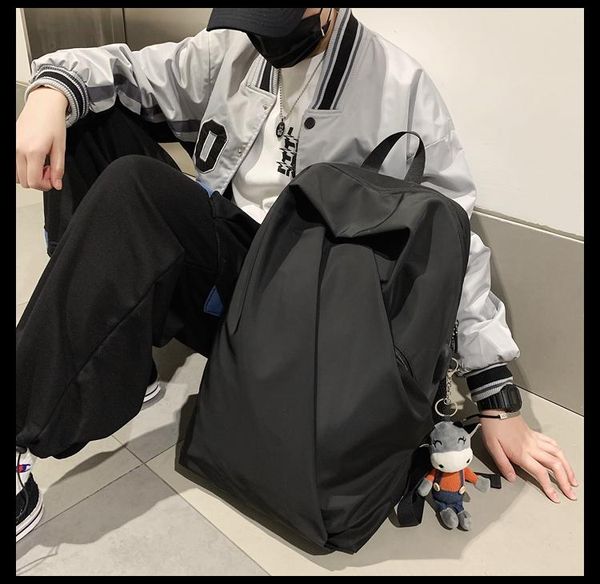 simple fashion trend female high school student college bag large capacity men's backpack
simple fashion trend female high school student college bag large capacity men's backpack