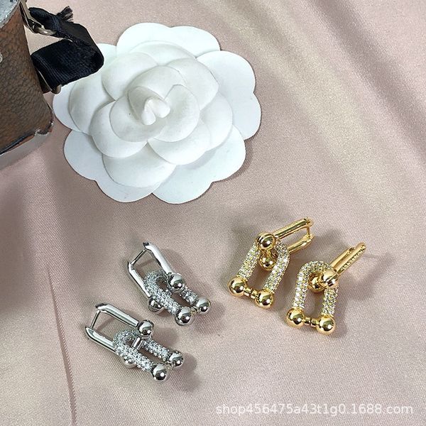 advanced feeling diamond double section u-shaped temperament ins cool wind zircon inlaid anti allergy earrings female, Golden
advanced feeling diamond double section u-shaped temperament ins cool wind zircon inlaid anti allergy earrings female, Golden