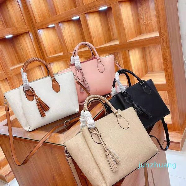 designer- women's handbag, shoulder bag purse, woven handle, leather tassel, two side lettered flower pattern
designer- women's handbag, shoulder bag purse, woven handle, leather tassel, two side lettered flower pattern
