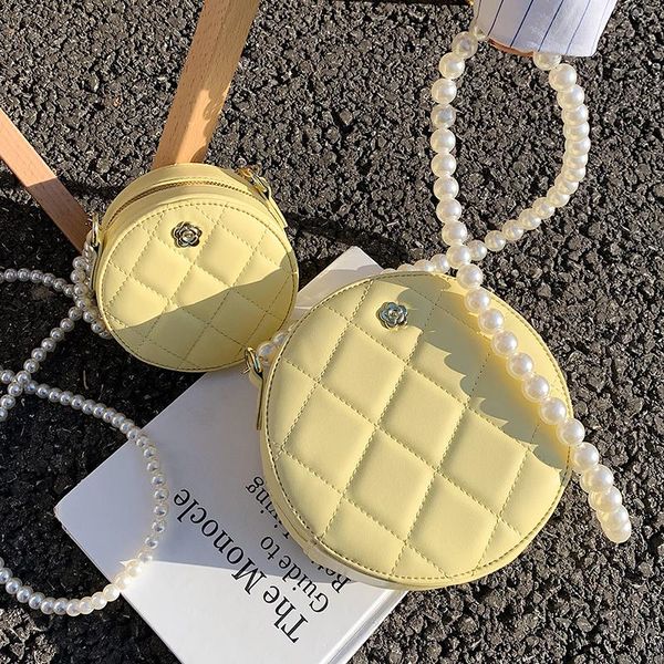 lattice round mini crossbody bag 2021 high-quality pu leather women's designer handbag pearl strap shoulder messenger bags
lattice round mini crossbody bag 2021 high-quality pu leather women's designer handbag pearl strap shoulder messenger bags