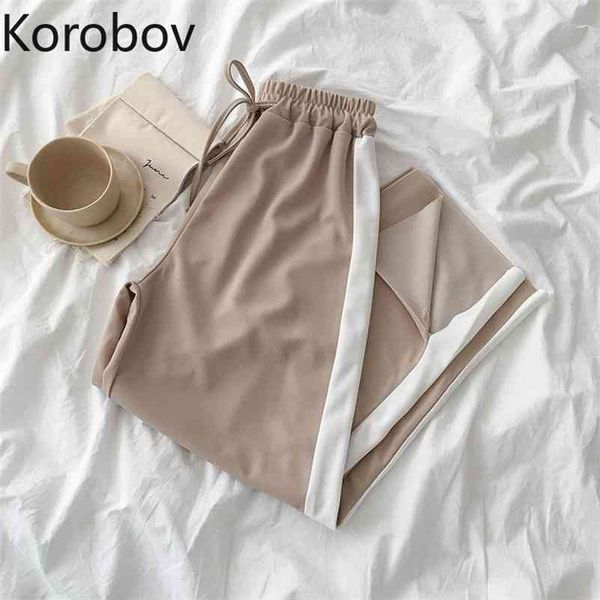 korobov new arrival high waist women trousers korean hit color patchwork wide leg pants vintage casual women joggers 210430, Black;white
korobov new arrival high waist women trousers korean hit color patchwork wide leg pants vintage casual women joggers 210430, Black;white