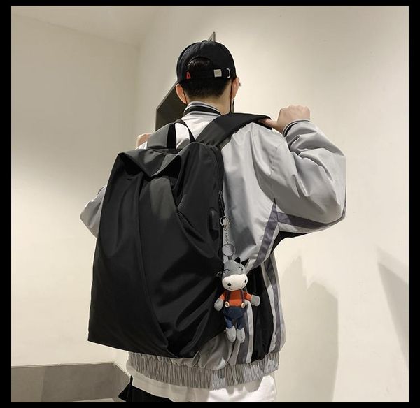 simple fashion trend female high school student college bag men backpack large capacity
simple fashion trend female high school student college bag men backpack large capacity