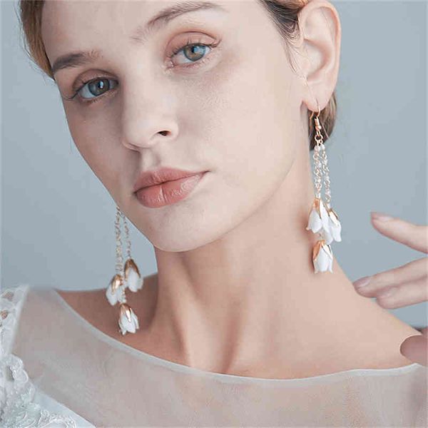 handmade ceramic flower tassel long earrings, the designer's latest style, 2021 golden baroque creative minimalist jewelry
handmade ceramic flower tassel long earrings, the designer's latest style, 2021 golden baroque creative minimalist jewelry