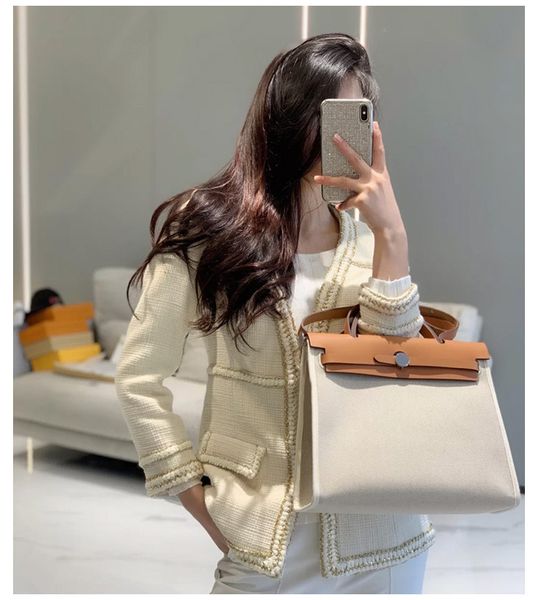 wholesale one versatile new shoulder fashion hand straddle canvas cowhide commuting women's bag yw ywluxurys designers bag
wholesale one versatile new shoulder fashion hand straddle canvas cowhide commuting women's bag yw ywluxurys designers bag