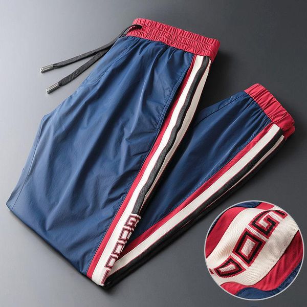 men's pants sports casual summer ice silk male loose wild trend korean version tide brand striped trousers clothing japanese, Black
men's pants sports casual summer ice silk male loose wild trend korean version tide brand striped trousers clothing japanese, Black