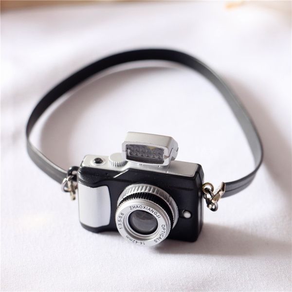 1 pc new fashion super cute mini doll accessories retro camera dollhouse miniature decoration toy for children gift 1471 y2
1 pc new fashion super cute mini doll accessories retro camera dollhouse miniature decoration toy for children gift 1471 y2