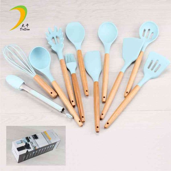 handle 12 sets of wooden silicone set non stick pot cooking tools combination kitchenware
handle 12 sets of wooden silicone set non stick pot cooking tools combination kitchenware