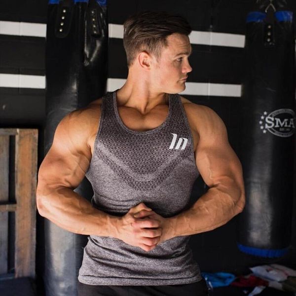 brand gym mens clothing fashion vest jogger fitness bodybuilding shirt muscle sportswear, White;black
brand gym mens clothing fashion vest jogger fitness bodybuilding shirt muscle sportswear, White;black