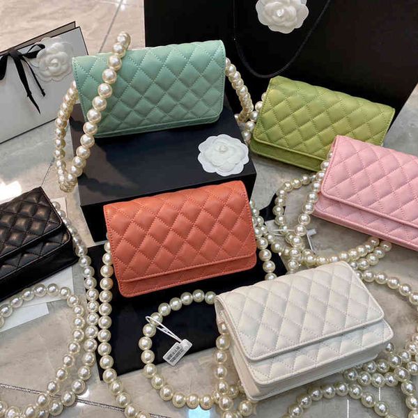 women luxurys designers bags 2021 pearl chain small fragrant wind sen department of aristocratic ladies wind lozenge fortune shoulder bag
women luxurys designers bags 2021 pearl chain small fragrant wind sen department of aristocratic ladies wind lozenge fortune shoulder bag