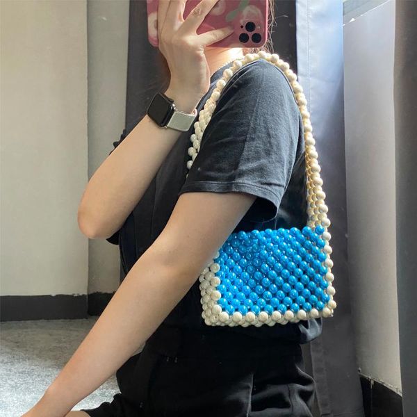 cross body the color-blocking single shoulder bag wide strap hand-woven diy beaded hit color illusion bags for women 2021
cross body the color-blocking single shoulder bag wide strap hand-woven diy beaded hit color illusion bags for women 2021