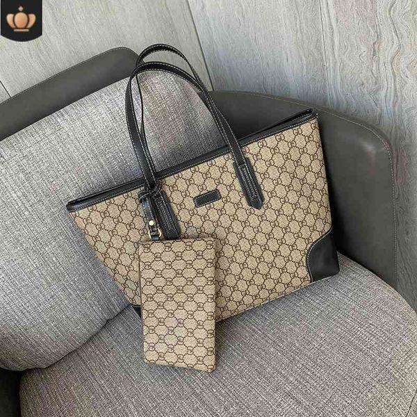 2022 latest handbag factory store single shoulder female pu2022 style mother large capacity tote bags
2022 latest handbag factory store single shoulder female pu2022 style mother large capacity tote bags
