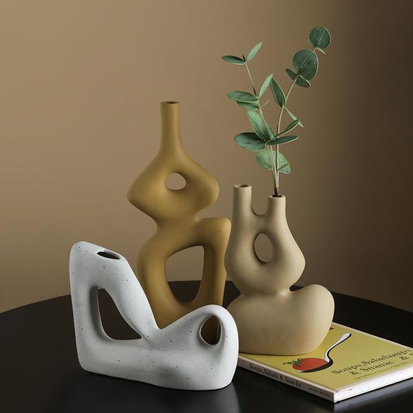 nordic art simple and special-shaped vase decoration, ceramic crafts, flower arrangement in the living room vases
nordic art simple and special-shaped vase decoration, ceramic crafts, flower arrangement in the living room vases