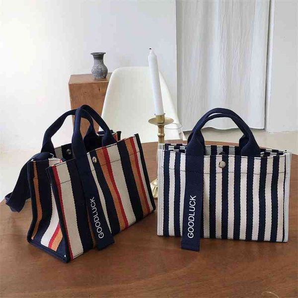 portable straddle stripe single shoulder canvas women's bag
portable straddle stripe single shoulder canvas women's bag