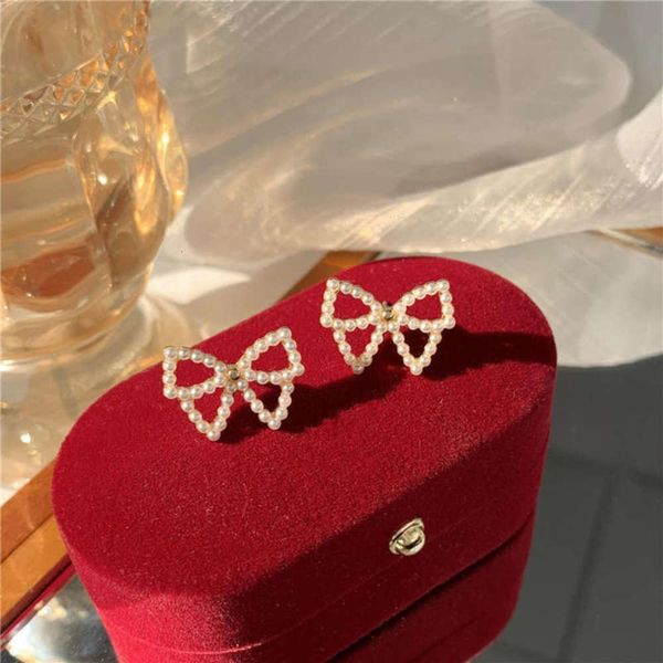 "love motto" bowknot pearl female temperament korean personality simple fashion versatile earrings, Black
"love motto" bowknot pearl female temperament korean personality simple fashion versatile earrings, Black