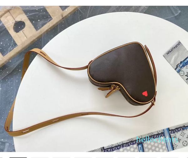 genuine leather heart-shaped designers luxurys bags handbags shoulder evening bag purses crossbody purse wallet size22
genuine leather heart-shaped designers luxurys bags handbags shoulder evening bag purses crossbody purse wallet size22