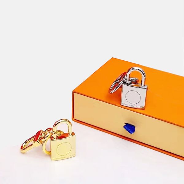 high qualtiy aolly lock desigen keyring holder brand keychain designers men women car bag key chain with box silver gold
high qualtiy aolly lock desigen keyring holder brand keychain designers men women car bag key chain with box silver gold