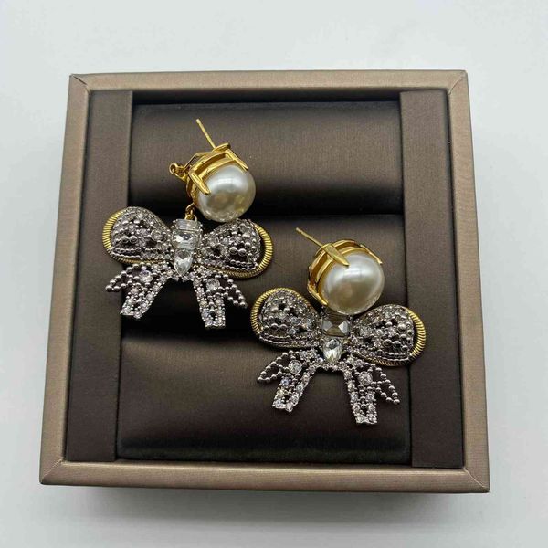 design jewelry miao's miu's new bowknot pearl star the same fashion celebrity temperament earrings ear clip earrings female, Golden
design jewelry miao's miu's new bowknot pearl star the same fashion celebrity temperament earrings ear clip earrings female, Golden