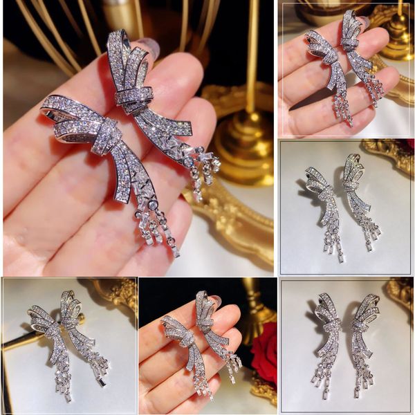 factory tassel luxury shining fashion bow designer long dangle earrings jewelry with crystal cz diamond stone for womepjs0, Golden;silver
factory tassel luxury shining fashion bow designer long dangle earrings jewelry with crystal cz diamond stone for womepjs0, Golden;silver